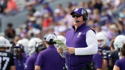 Ex-Northwestern football coach fired in hazing scandal sues for US$130 million