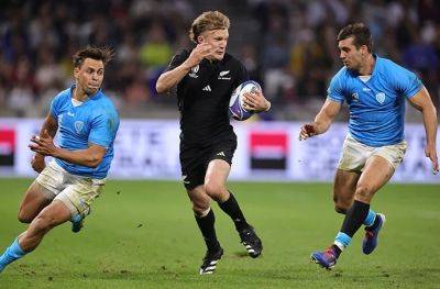 All Blacks qualify for Rugby World Cup quarters after 11-try Uruguay thrashing