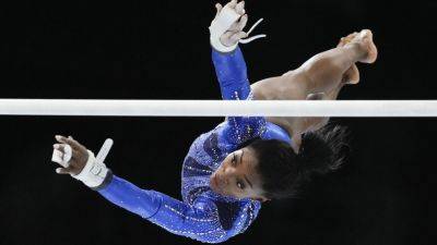 Simone Biles - Paris Olympics - Simone Biles wins 21st world title to become most decorated gymnast in history - france24.com - France - Belgium - Brazil - Usa - Japan