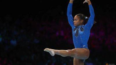 Gymnastics-Biles wins sixth all-around world championships title