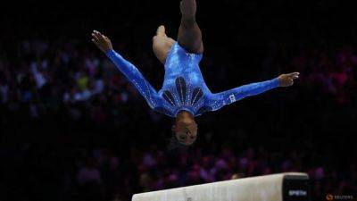 Simone Biles - Gymnastics-Record-breaker Biles wins sixth all-around world title - channelnewsasia.com - Belgium - Brazil - Usa - Belarus - county Jones