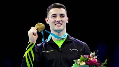 Rhys McClenaghan targets podium Olympic finish after winning back-to-back world titles