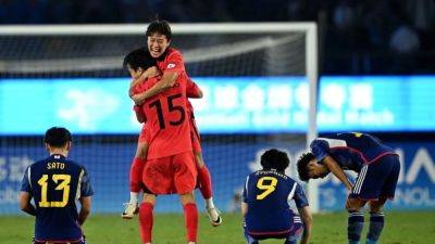 Paris St Germain - Hugh Lawson - Lee Kang - Games-South Korea retain Asian Games soccer gold as Cho hits comeback winner - channelnewsasia.com - France - China - Uzbekistan - Japan - Hong Kong - South Korea - North Korea