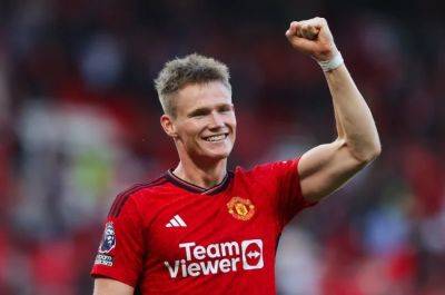 McTominay's dramatic double lifts Man United as 10-man Spurs go top