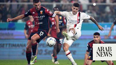 Pulisic strikes, Giroud saves as Milan move top with late drama at Genoa