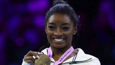 Simone Biles - Gymnastics-Brilliant Biles wins two more golds on final day at worlds - channelnewsasia.com - Britain - Germany - Belgium - Brazil - Usa - China - county Young