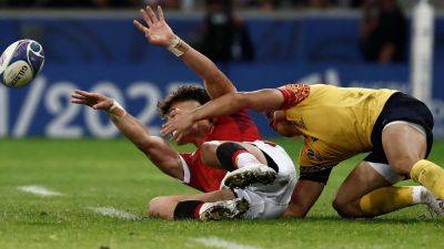 Tonga go out with a win but Romania battle to the end