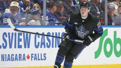 Maple Leafs deal forward Lafferty to Canucks for 5th-round draft pick