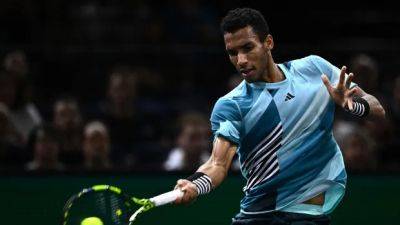 Auger-Aliassime's 6-match win streak halted by Tsitsipas in 2nd round of Paris Masters