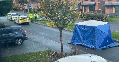 Murder investigation launched after 'woman killed' as street shut off - updates - manchestereveningnews.co.uk