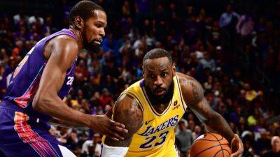 LeBron James outduels Kevin Durant despite painful shin injury - ESPN