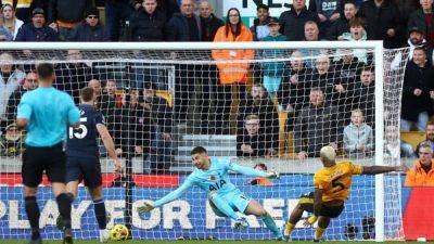 Wolves stun Spurs 2-1 with two stoppage-time goals