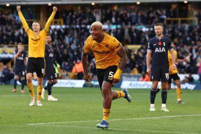 Wolves stun Tottenham with stoppage-time goals