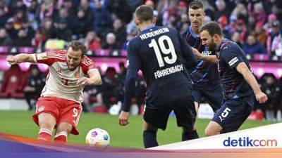Bayern Munich - Manuel Neuer - Harry Kane - Raphael Guerreiro - Bundesliga - Bayern Vs Heidenheim: Drama enam Gol, Die Roten Menang 4-2 - sport.detik.com
