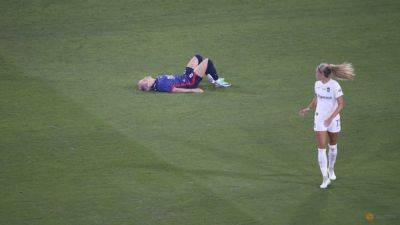 Rapinoe suffers 'devastating' early exit with injury in final match