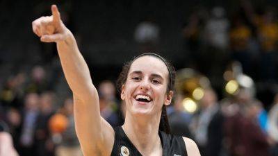 Caitlin Clark becomes Iowa's all-time leading scorer in win - ESPN