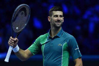 Novak Djokovic to end year as world No 1 after opening win at ATP Finals