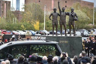 Thousands pay their respects to Manchester United and England great Sir Bobby Charlton