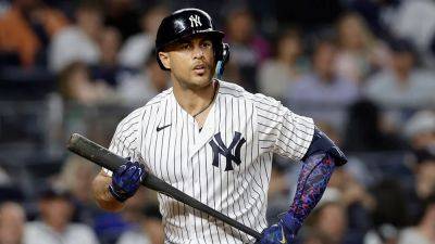 Giancarlo Stanton's agent, Yankees general manager Brian Cashman in war of words over 'injury-prone' slugger