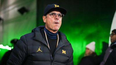 Michigan may win 1,000th game Saturday without Jim Harbaugh, who could be feeding chickens and cutting grass