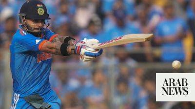 Kohli, Shami star as India beat New Zealand to reach World Cup final