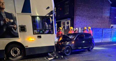 Head-on crash between bus and car as emergency crews respond