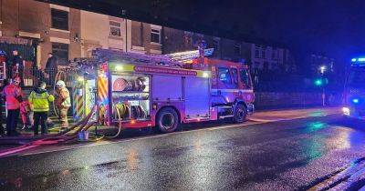 Fire breaks out at row of houses before people evacuated