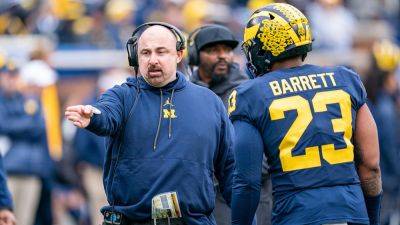 Michigan assistant coach Chris Partridge dismissed just one day after Jim Harbaugh accepts three-game ban