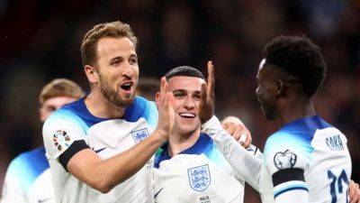 Lacklustre England seal top spot with win over Malta