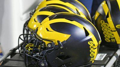 Sources: New NCAA evidence changed Michigan's stance on investigation - ESPN