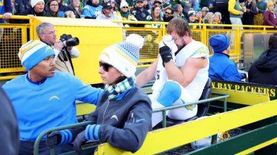 Chargers' Joey Bosa carted off vs. Packers with foot injury - ESPN