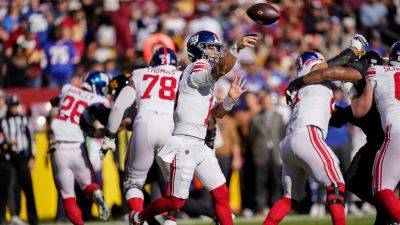 Tommy DeVito picks up first career win as Giants' defense picks off Sam Howell 3 times