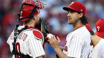 Free-agent pitcher Aaron Nola returns to Phillies, signing 7-year deal