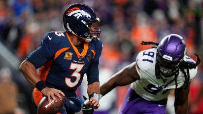 Russell Wilson - Denver Broncos - David Zalubowski - Jack Dempsey - Russell Wilson throws clutch TD pass to lift Broncos to 4th straight win - foxnews.com - state Minnesota