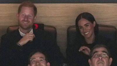 Meghan Markle - Quinn Hughes - Elizabeth Ii - Prince Harry, Meghan Markle appear at Canucks game to promote Invictus Games - foxnews.com - Britain - Canada