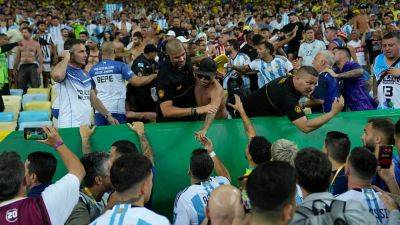 Brazil-Argentina World Cup qualifier delayed after fans brawl in stands