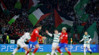 Scottish club Celtic fined for fans displaying hundreds of Palestinian flags at Champions League game