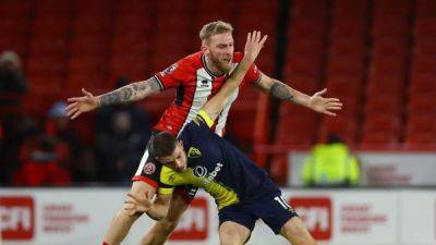 Tavernier double gives Bournemouth 3-1 win over lacklustre Sheffield United