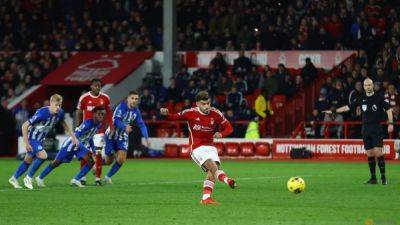 Ten-man Brighton back to winning ways with victory at Forest