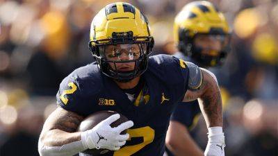 Michigan defeats Ohio State for third straight year after last-minute interception