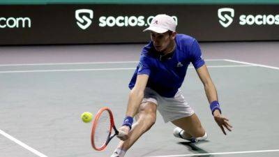 Arnaldi gives Italy 1-0 lead over Australia in Davis Cup final
