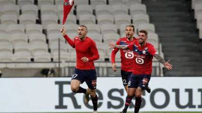 Paris St Germain - Jonathan David - Lille win 2-0 away to struggling Lyon - channelnewsasia.com - Monaco