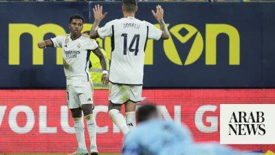 Rodrygo scores twice as Real Madrid beat Cadiz 3-0 to go top in Spanish league