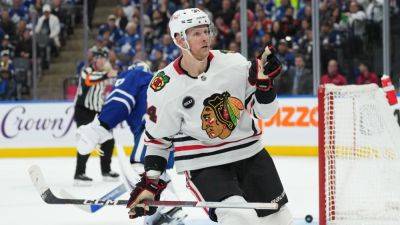 Blackhawks waive Corey Perry for 'unacceptable' conduct - ESPN