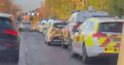 Huge emergency response and boat units called to canal as two men rescued and taken to hospital - manchestereveningnews.co.uk