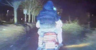 Moment masked trio's escape from police on 'stolen' moped comes to a premature end - manchestereveningnews.co.uk