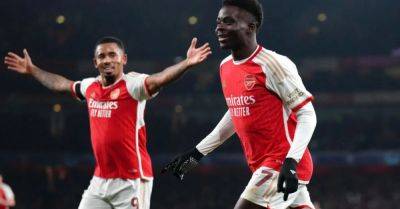 Arsenal cruise into Champions League last 16 after hammering Lens