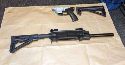 '3D-printed guns' and ammunition seized in police raid with two arrested