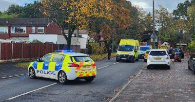 Road blocked as emergency services respond to crash between car and bus