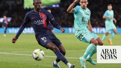 Dembele shines as PSG climb top of Ligue 1
